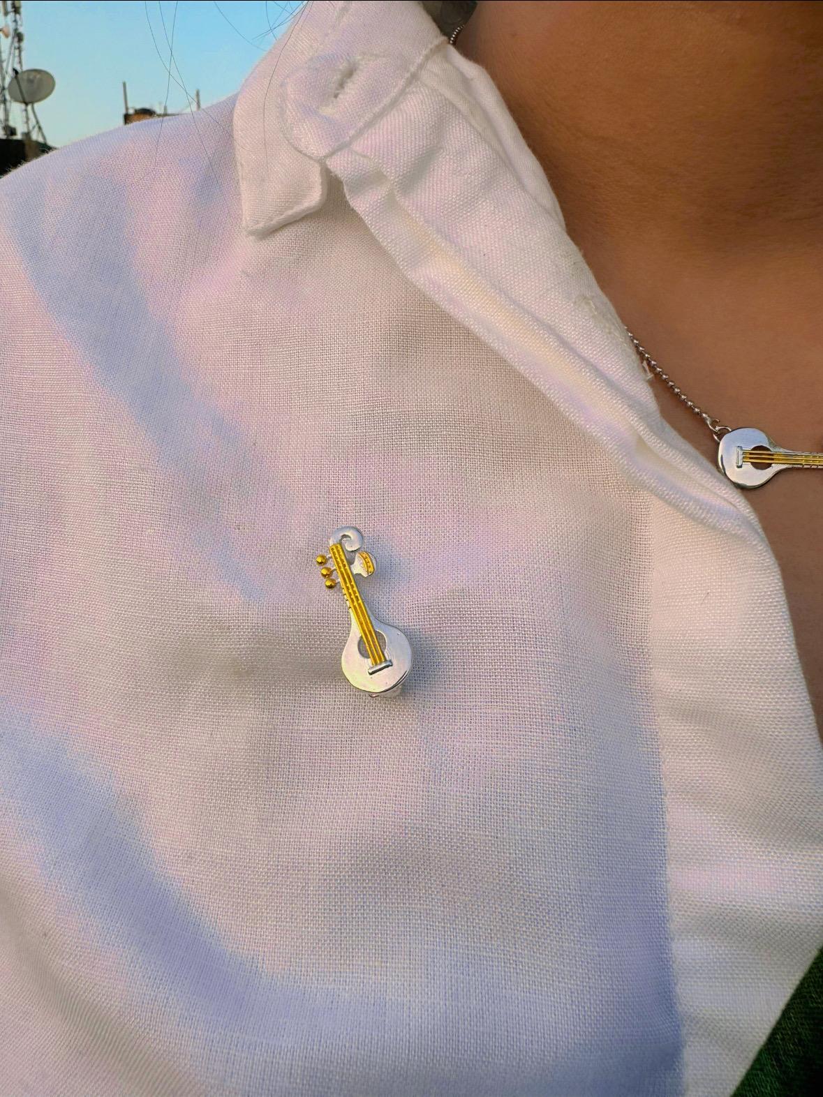 Veena brooch