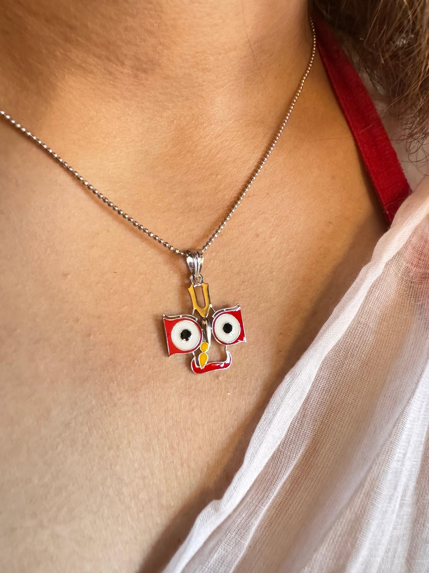 Jagannath eye pendant in dual tone