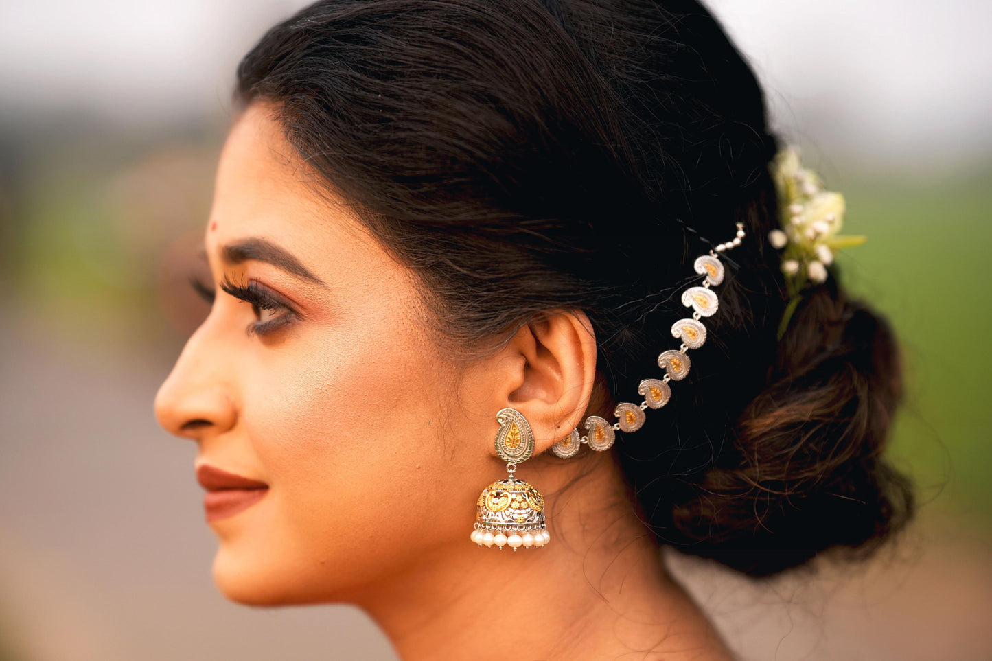 Aam kolka jhumka with kaan tana