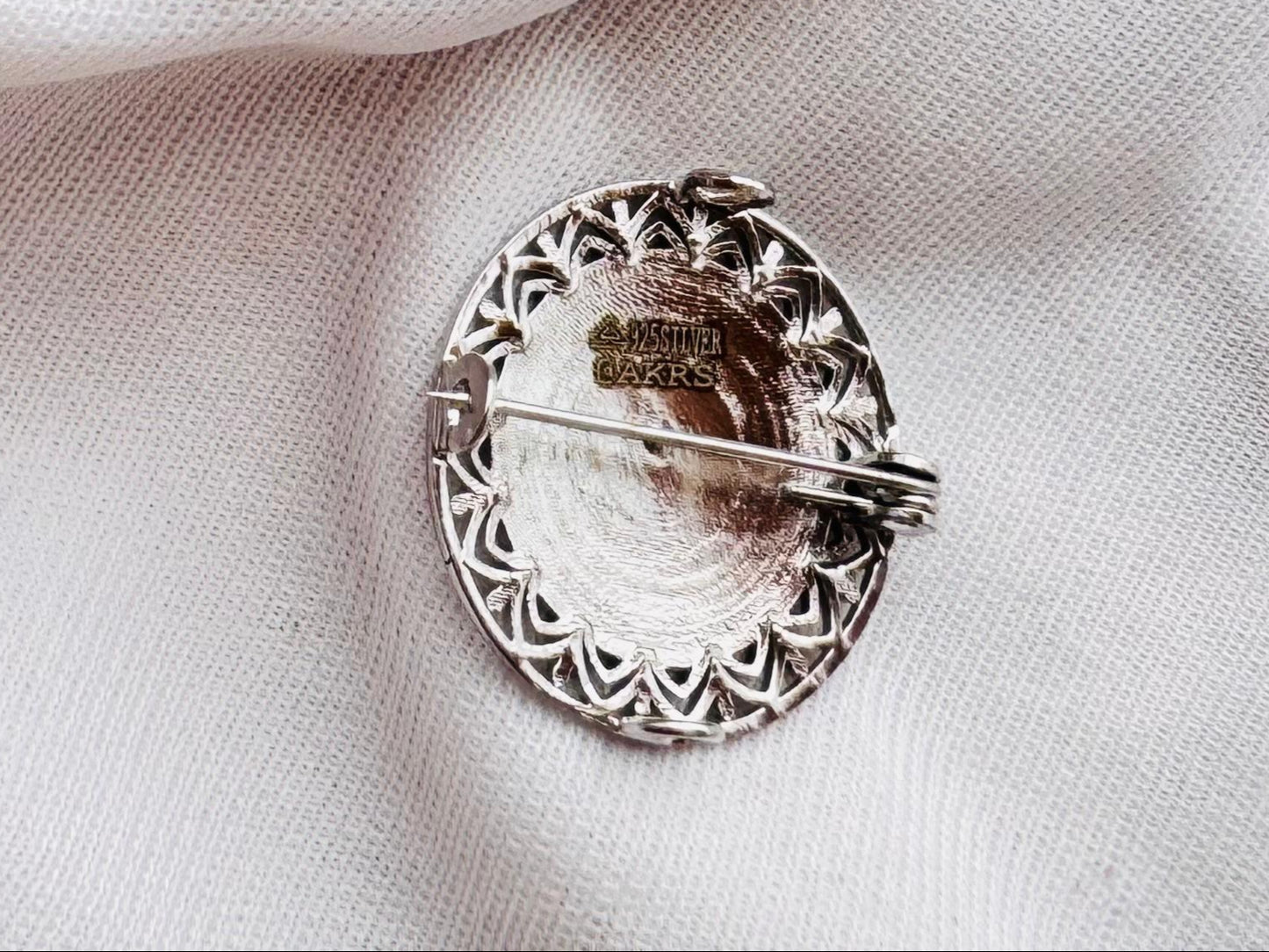 Chariot wheel brooch