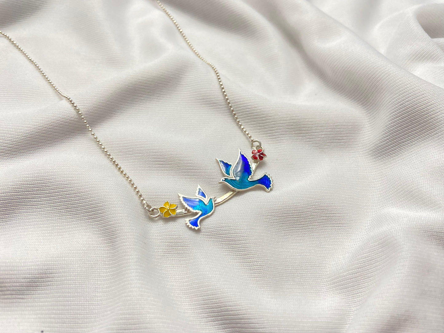 Twin bird necklace