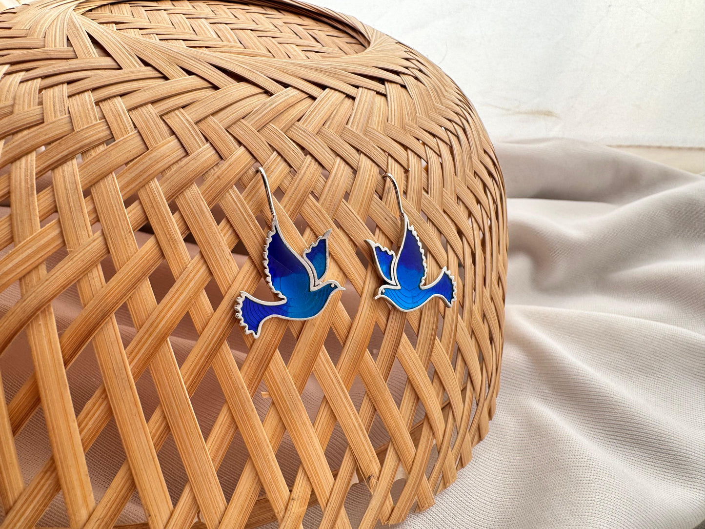 Blue bird hanging earring
