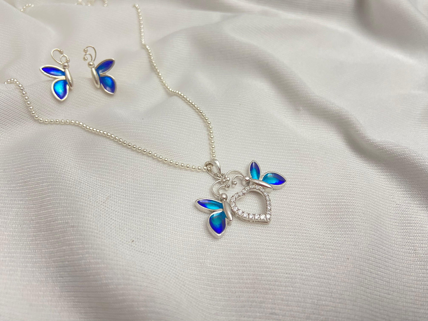 Twin butterfly with a heart combo