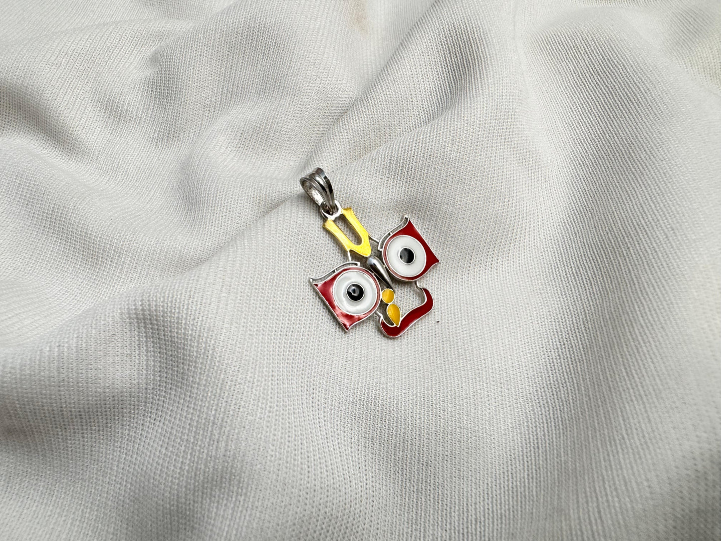 Jagannath eye pendant in dual tone