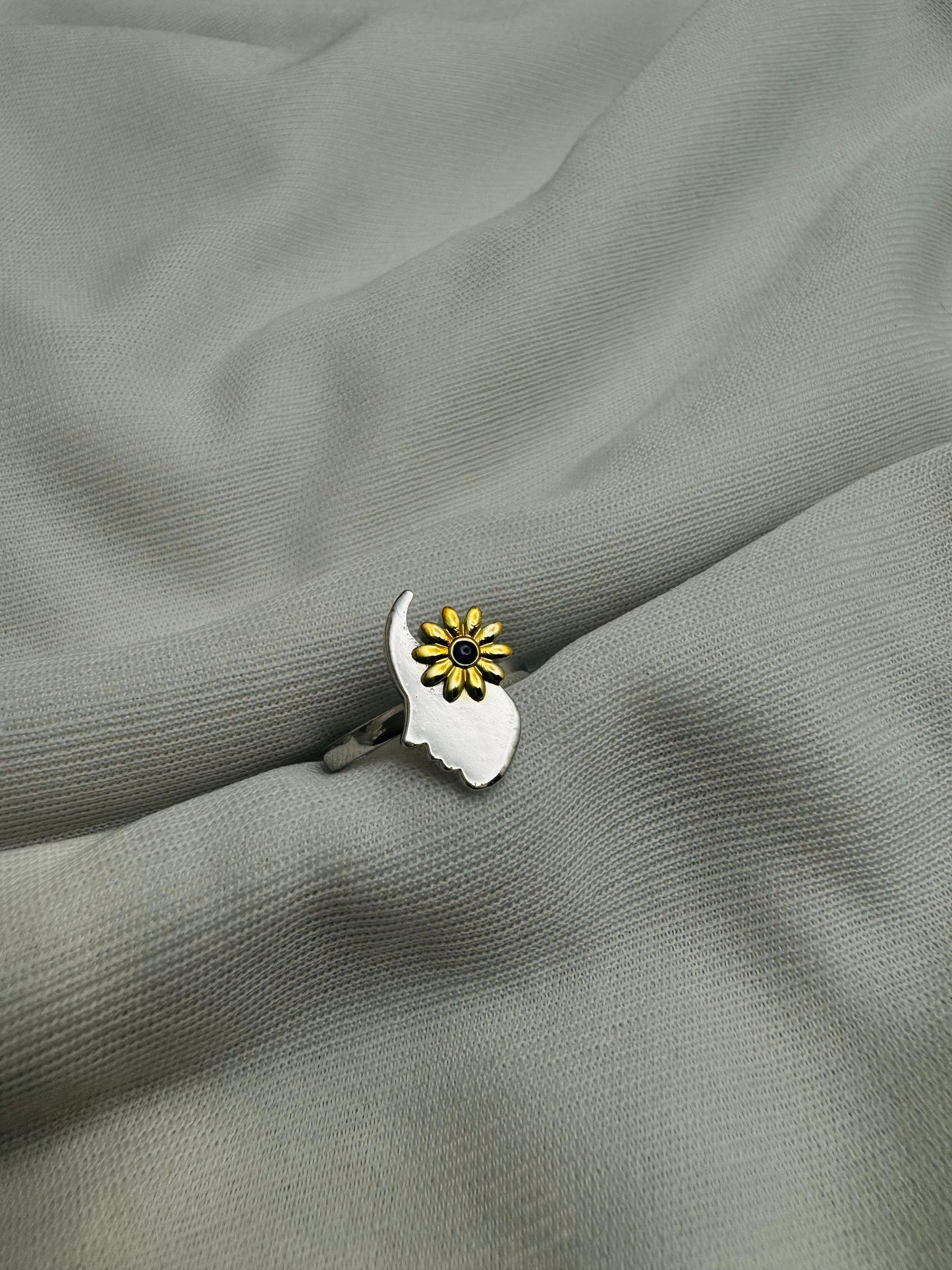 Woman with flower ring