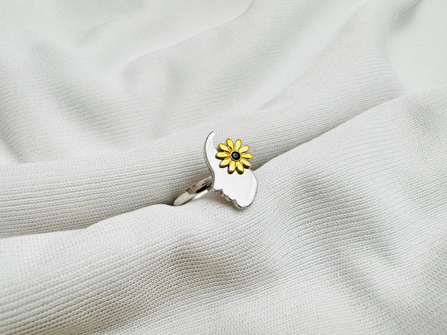 Woman with flower ring