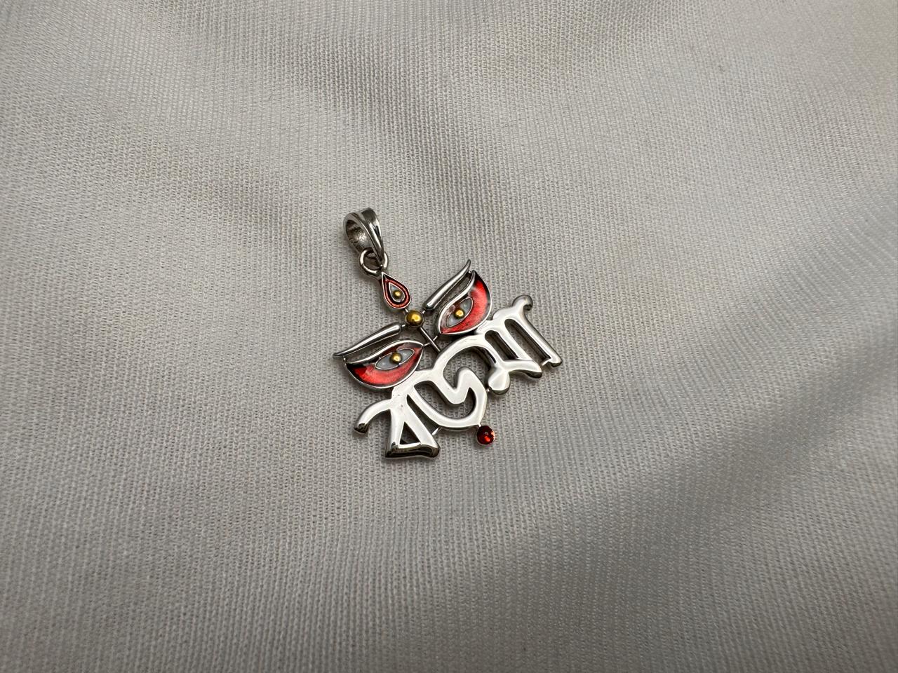Boromaa pendant with 24k gold highlighting