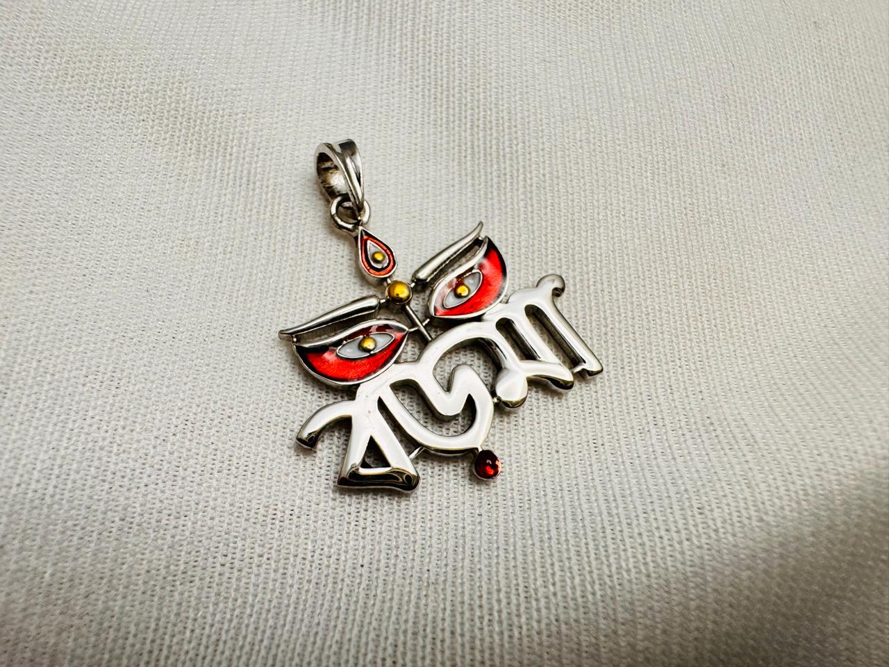 Boromaa pendant with 24k gold highlighting