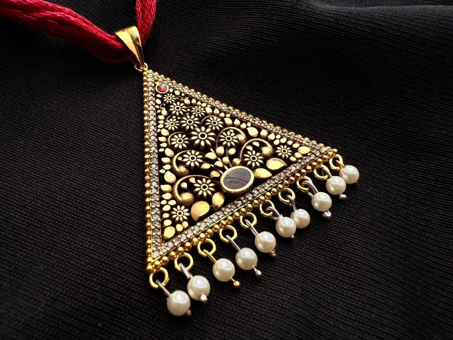 Pavo cristatus jal work triangular pendant