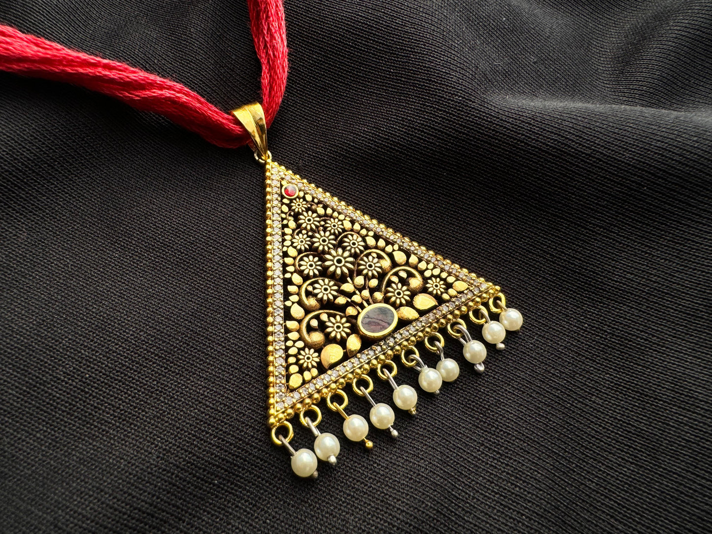 Pavo cristatus jal work triangular pendant