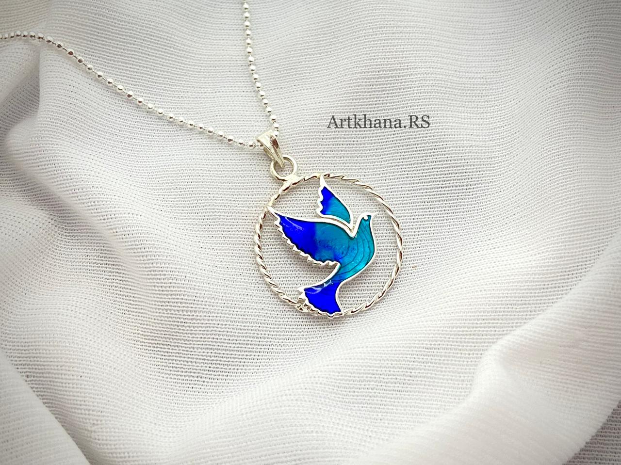 Blue bird round pendant