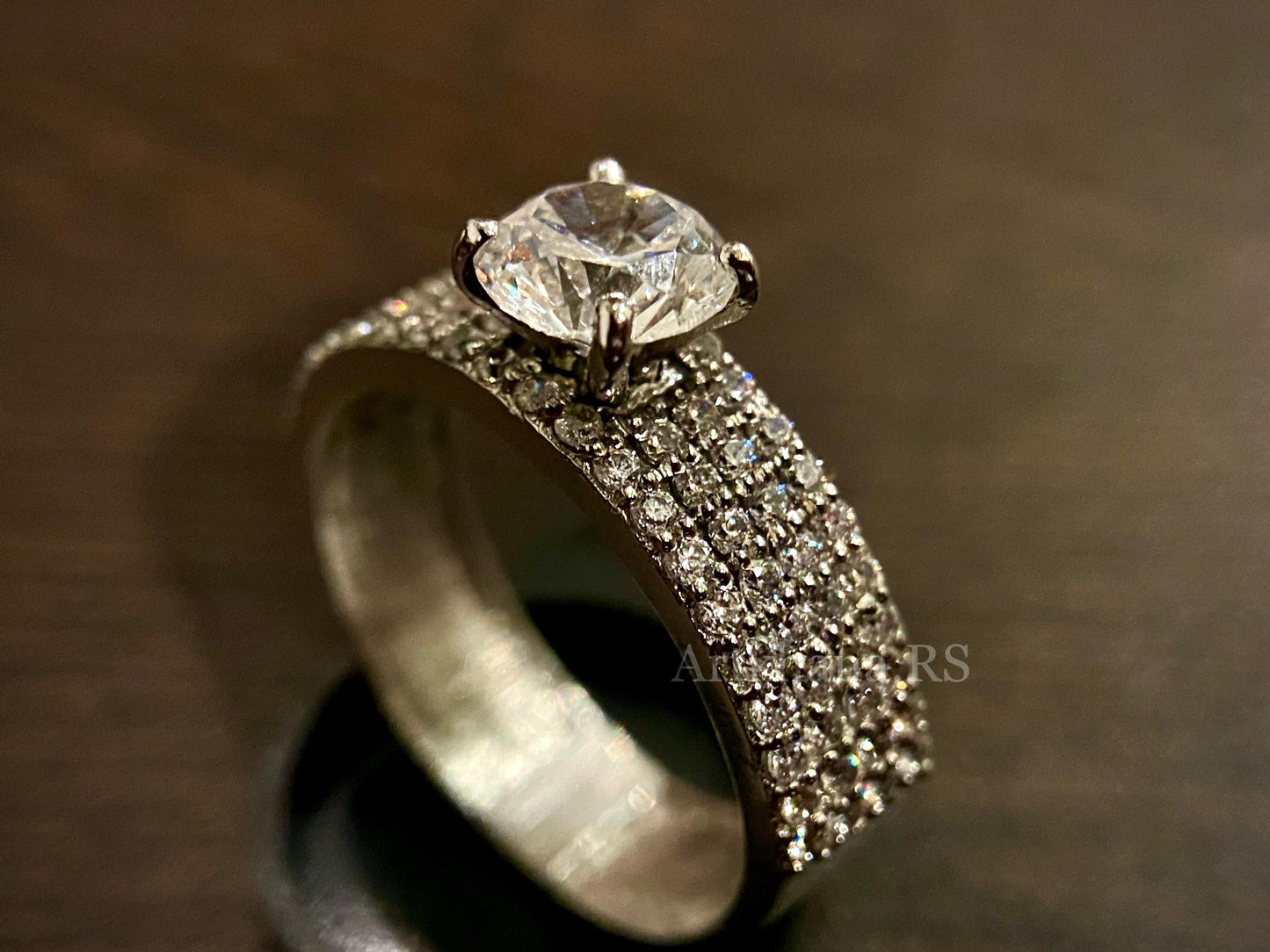 Band solitaire ring