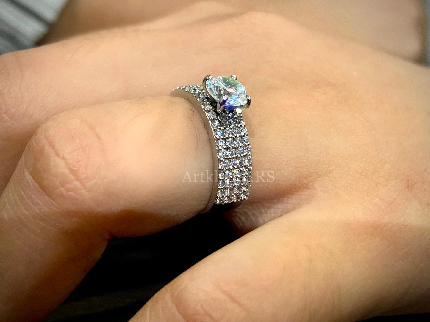 Band solitaire ring