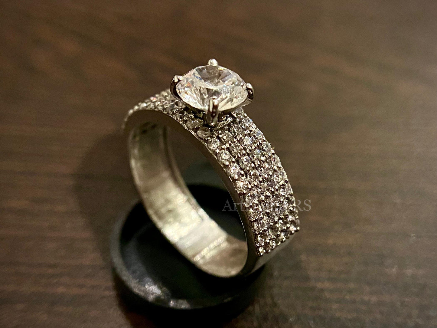 Band solitaire ring