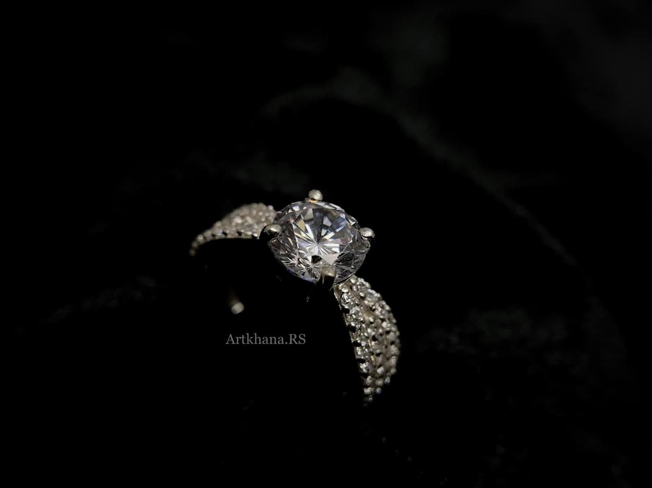 Solitaire ribbon ring