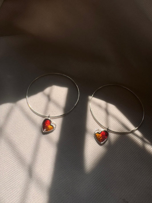 Hanging heart hoop earring
