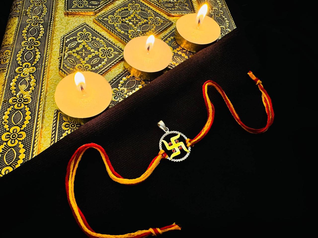 Swastik rakhi cum pendant