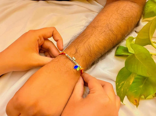 Krishna flute rakhi cum pendant