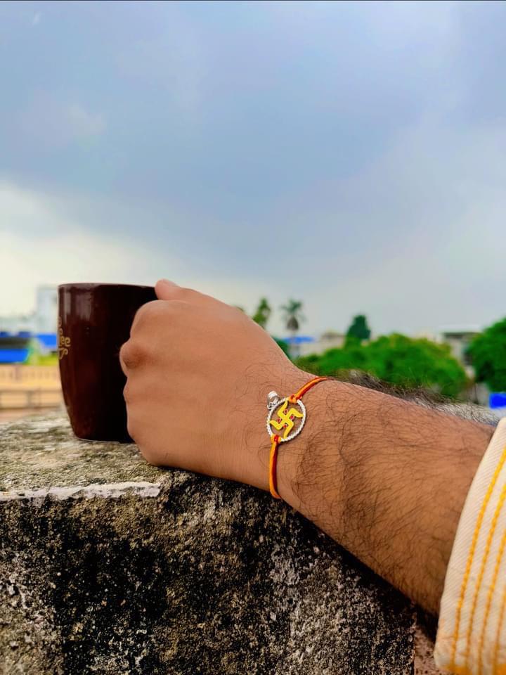 Swastik rakhi cum pendant