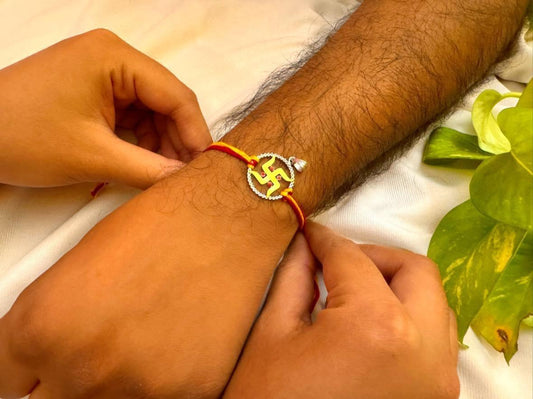 Swastik rakhi cum pendant