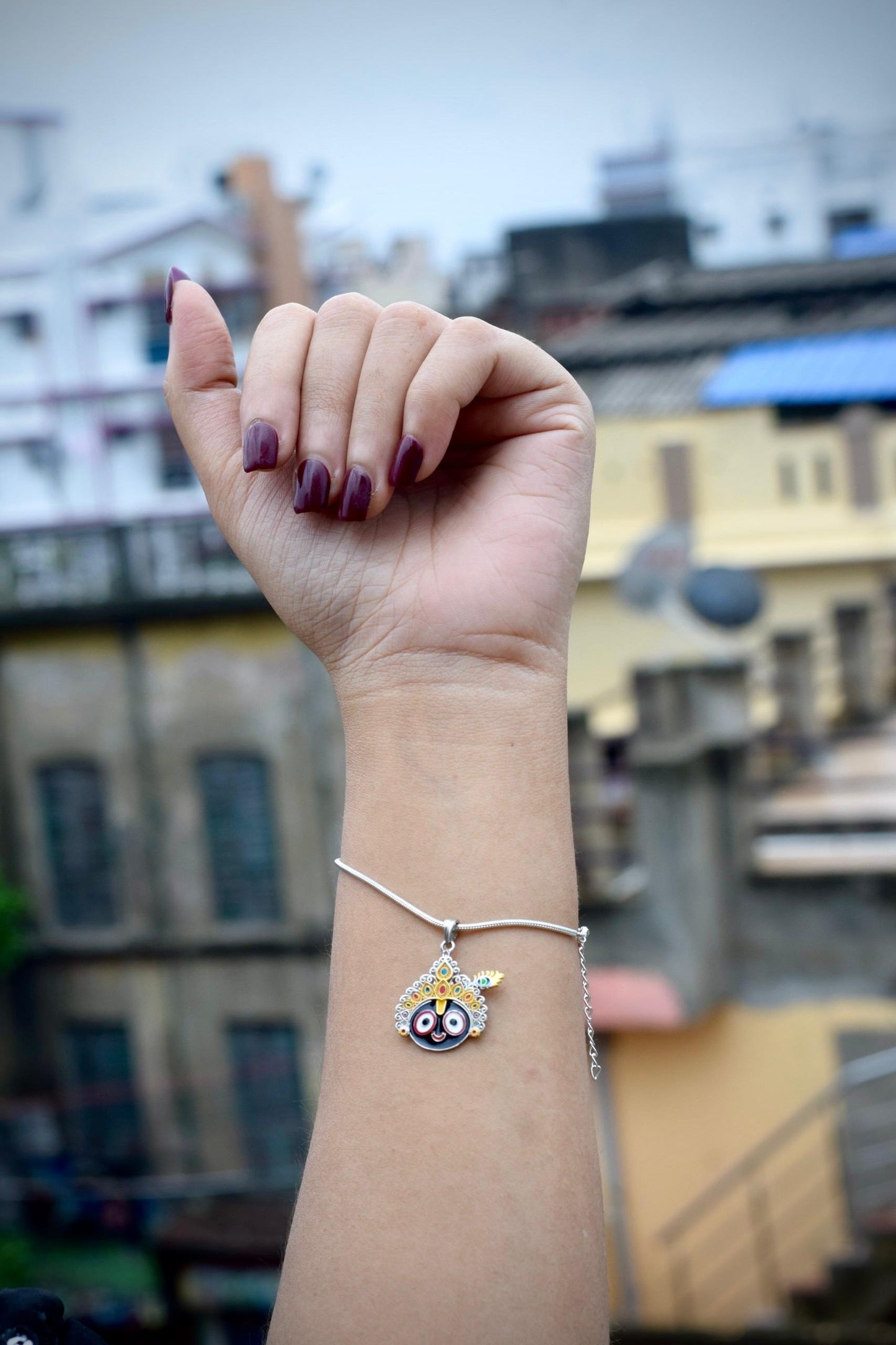 Nathkhat Jagannath charm wristlet
