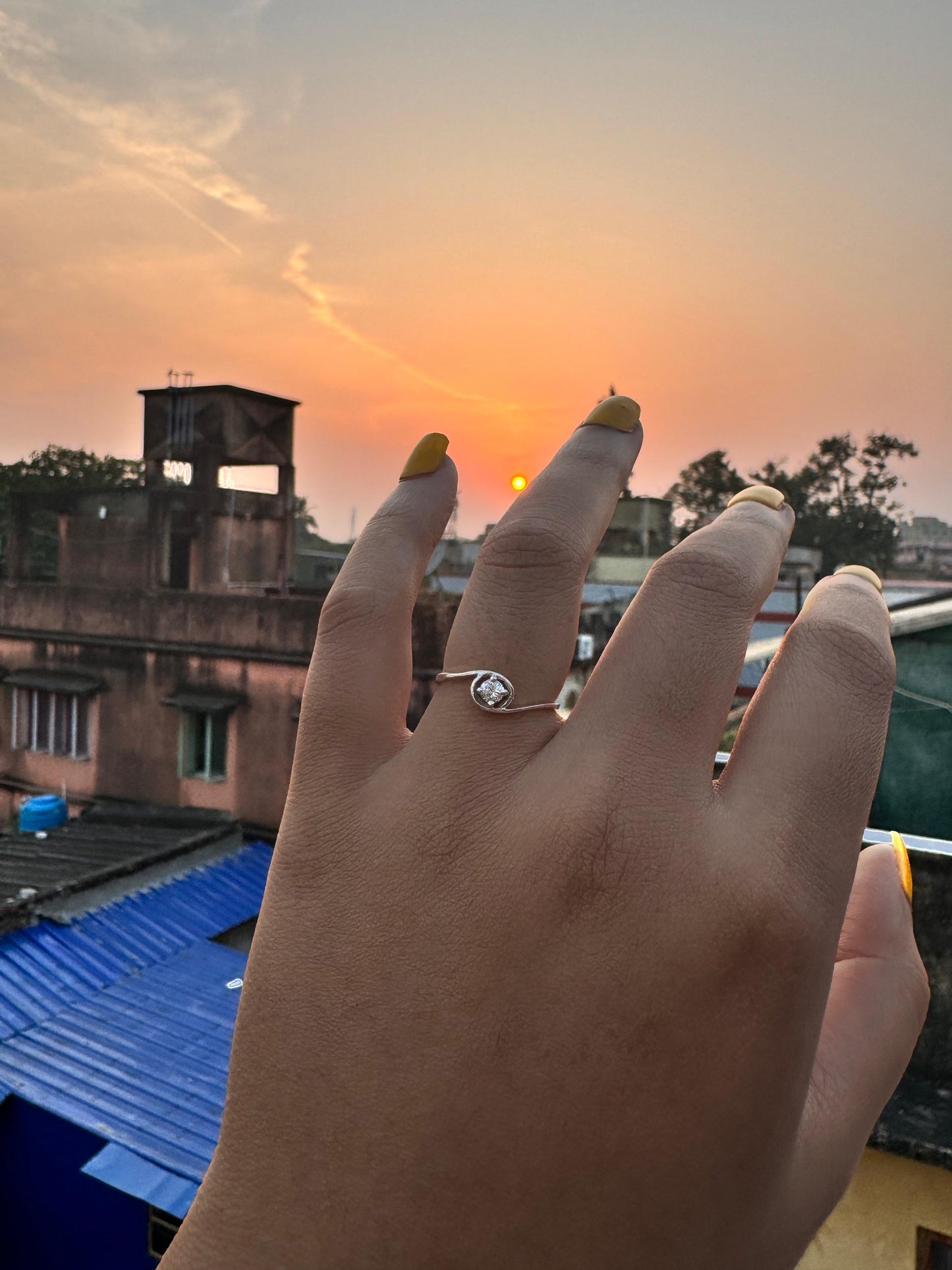 Open-eye sparkling zircon ring