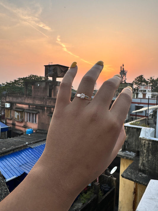 Sleek band solitaire ring