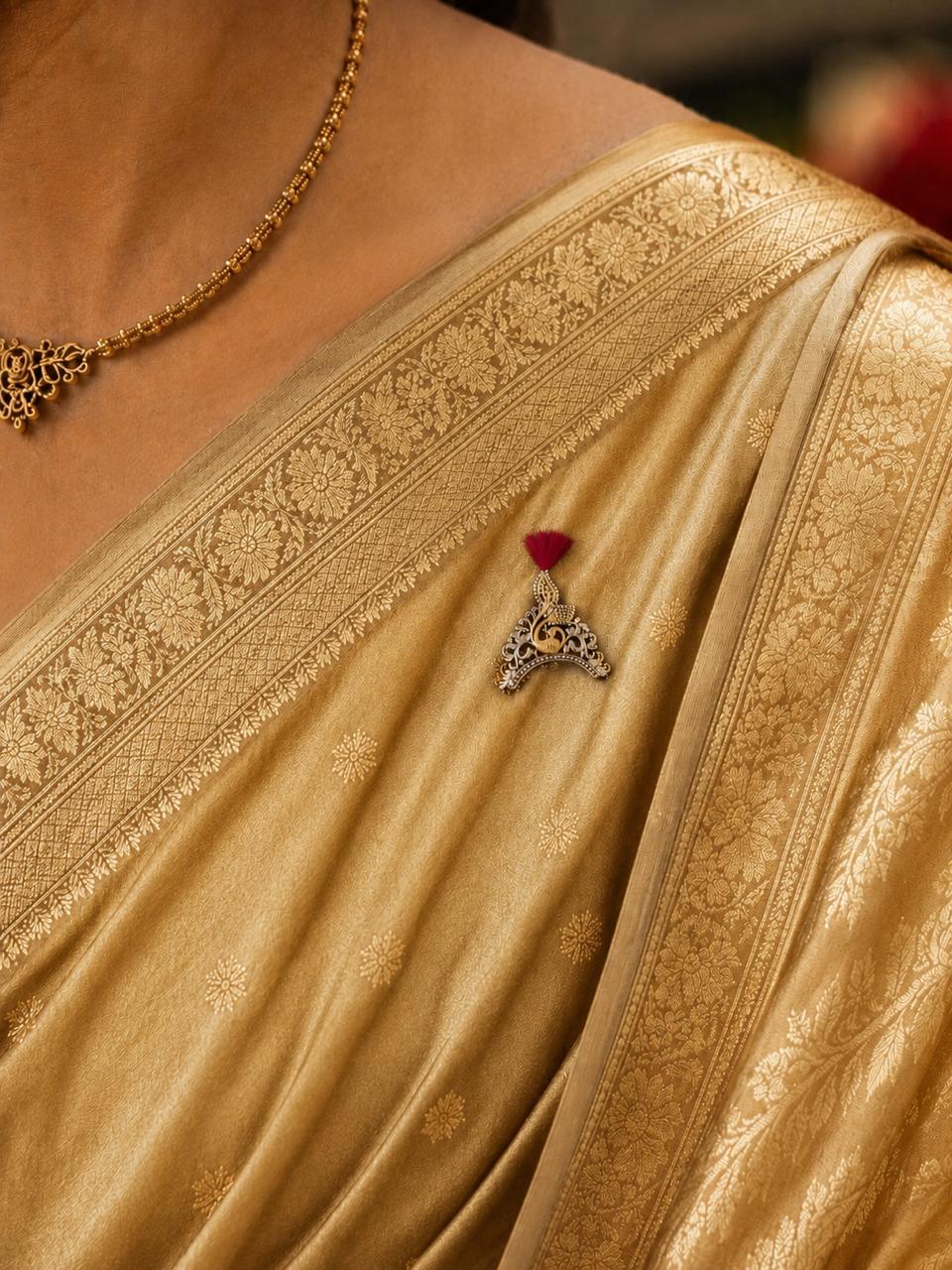 Mukut brooch